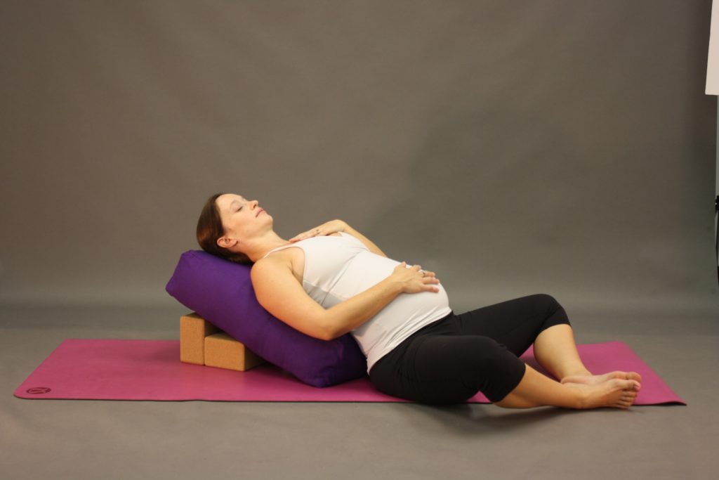 Reclined Bound Angle Pose (Supta Bandha Konasana) with Bolsters